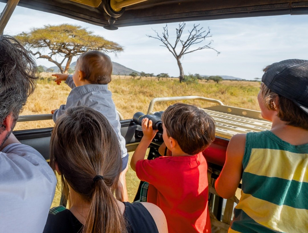 Family on safari in Tanzania with children
